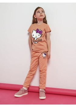 Sinsay - Spodnie dresowe Hello Kitty - pomarańczowy ze sklepu Sinsay w kategorii Spodnie dziewczęce - zdjęcie 161216506