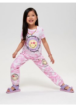 Sinsay - Spodnie dresowe jogger SmileyWorld® - kremowy ze sklepu Sinsay w kategorii Spodnie dziewczęce - zdjęcie 161229978