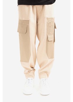 Neil Barett spodnie dresowe bawełniane Workwear Loose Sweatpnts kolor beżowy proste BJP019CH.S533S.3336-KREM ze sklepu PRM w kategorii Spodnie męskie - zdjęcie 161414185