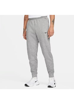 Męskie zwężane spodnie do fitnessu Therma-FIT Nike Therma - Szary ze sklepu Nike poland w kategorii Spodnie męskie - zdjęcie 161522797