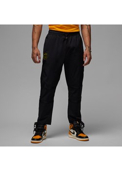 Męskie spodnie z tkaniny Paris Saint-Germain - Czerń ze sklepu Nike poland w kategorii Spodnie męskie - zdjęcie 161523507
