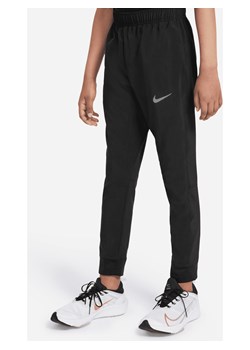 Spodnie treningowe z tkaniny dla dużych dzieci (chłopców) Nike Dri-FIT - Czerń ze sklepu Nike poland w kategorii Spodnie chłopięce - zdjęcie 161523909