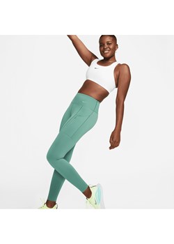 Damskie legginsy o pełnej długości ze średnim stanem i kieszeniami zapewniające mocne wsparcie Nike Go - Zieleń ze sklepu Nike poland w kategorii Spodnie damskie - zdjęcie 161524435