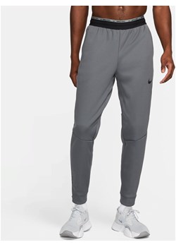 Męskie spodnie do fitnessu Nike Therma-FIT Therma Sphere - Szary ze sklepu Nike poland w kategorii Spodnie męskie - zdjęcie 161525918