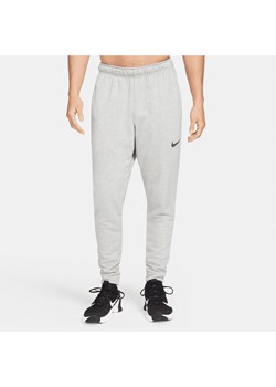 Męskie zwężane spodnie do fitnessu z dzianiny Dri-FIT Nike Dry - Szary ze sklepu Nike poland w kategorii Spodnie męskie - zdjęcie 161526168
