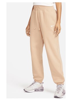 Damskie spodnie dresowe o kroju oversize z wysokim stanem Nike Sportswear Phoenix Fleece - Brązowy ze sklepu Nike poland w kategorii Spodnie damskie - zdjęcie 161526359