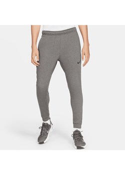 Męskie zwężane spodnie do fitnessu z dzianiny Dri-FIT Nike Dry - Szary ze sklepu Nike poland w kategorii Spodnie męskie - zdjęcie 161526517