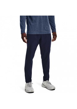 Męskie spodnie treningowe Under Armour  Unstoppable Tapered Pants - granatowe ze sklepu Sportstylestory.com w kategorii Spodnie męskie - zdjęcie 161604516