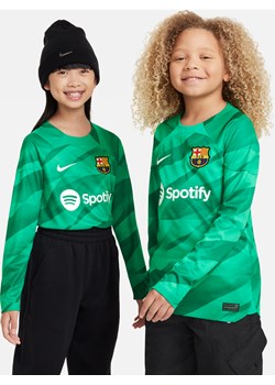 Koszulka piłkarska dla dużych dzieci Nike Dri-FIT FC Barcelona Stadium Goalkeeper 2023/24 - Zieleń ze sklepu Nike poland w kategorii Bluzki dziewczęce - zdjęcie 161610926