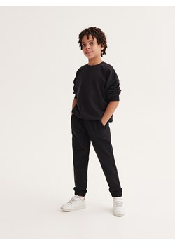 Reserved - Dresowe spodnie jogger - czarny ze sklepu Reserved w kategorii Spodnie chłopięce - zdjęcie 161768459