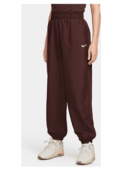 Damskie joggery z tkaniny Nike Sportswear - Brązowy ze sklepu Nike poland w kategorii Spodnie damskie - zdjęcie 162132038