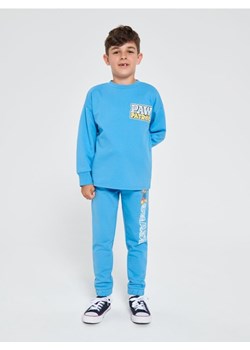 Sinsay - Spodnie dresowe jogger Psi Patrol - mid blue ze sklepu Sinsay w kategorii Spodnie chłopięce - zdjęcie 162268469