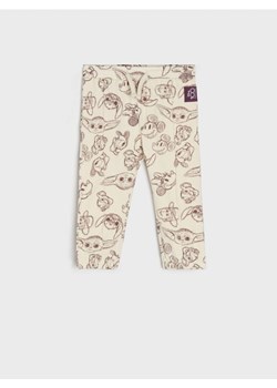 Sinsay - Spodnie dresowe Disney 100 - kremowy ze sklepu Sinsay w kategorii Spodnie i półśpiochy - zdjęcie 162390117