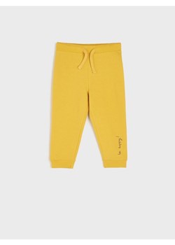 Sinsay - Spodnie dresowe jogger - żółty ze sklepu Sinsay w kategorii Spodnie i półśpiochy - zdjęcie 162513035