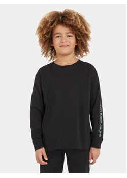 Calvin Klein Jeans Bluzka Glow In The Dark IB0IB01897 Czarny Regular Fit ze sklepu MODIVO w kategorii T-shirty chłopięce - zdjęcie 162535675
