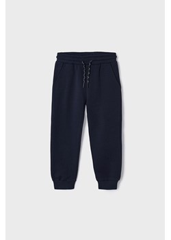 Granatowe spodnie dresowe chłopięce ze sklepu 5.10.15 w kategorii Spodnie chłopięce - zdjęcie 162810608