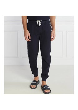 Tommy Hilfiger Spodnie dresowe | Regular Fit ze sklepu Gomez Fashion Store w kategorii Spodnie męskie - zdjęcie 163345237