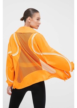 adidas by Stella McCartney wiatrówka TruePace kolor pomarańczowy przejściowa oversize ze sklepu ANSWEAR.com w kategorii Kurtki damskie - zdjęcie 163403947