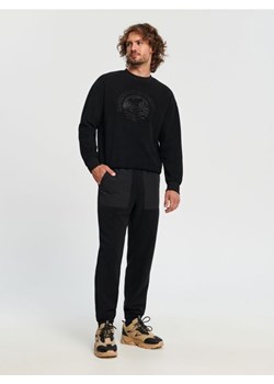 Sinsay - Spodnie dresowe comfort - czarny ze sklepu Sinsay w kategorii Spodnie męskie - zdjęcie 163435679