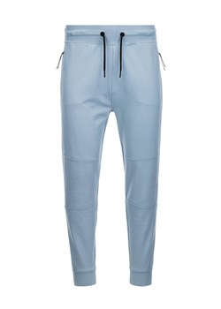 Spodnie męskie dresowe joggery - jasnoniebieskie V2 OM-PASK-0142 ze sklepu ombre w kategorii Spodnie męskie - zdjęcie 163491577