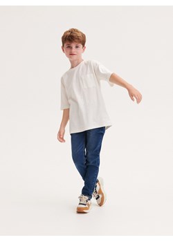 Reserved - Elastyczne jeansy slim - granatowy ze sklepu Reserved w kategorii Spodnie chłopięce - zdjęcie 163585106