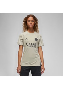 Damska dzianinowa koszulka piłkarska z krótkim rękawem Jordan Dri-FIT Paris Saint-Germain Strike (wersja trzecia) - Brązowy ze sklepu Nike poland w kategorii Bluzki damskie - zdjęcie 163602756