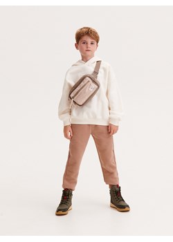 Reserved - Dresowe spodnie jogger - brązowy ze sklepu Reserved w kategorii Spodnie chłopięce - zdjęcie 163634096