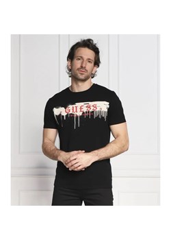GUESS T-shirt GRAFFITI DRIPS | Regular Fit ze sklepu Gomez Fashion Store w kategorii T-shirty męskie - zdjęcie 163975079