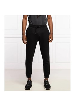 GUESS ACTIVE Spodnie dresowe ALDWIN | Regular Fit ze sklepu Gomez Fashion Store w kategorii Spodnie męskie - zdjęcie 164318508