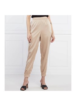 GUESS Spodnie JAY | Loose fit ze sklepu Gomez Fashion Store w kategorii Spodnie damskie - zdjęcie 164322978