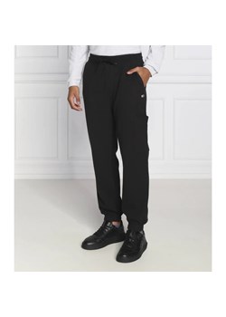 Tommy Jeans Spodnie dresowe TJM BAX | Regular Fit ze sklepu Gomez Fashion Store w kategorii Spodnie męskie - zdjęcie 164328448