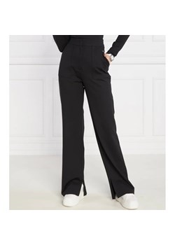 CALVIN KLEIN JEANS Spodnie dresowe MILANO | flare fit ze sklepu Gomez Fashion Store w kategorii Spodnie damskie - zdjęcie 164329909
