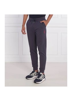 GUESS Spodnie dresowe Adam | Regular Fit ze sklepu Gomez Fashion Store w kategorii Spodnie męskie - zdjęcie 164330468