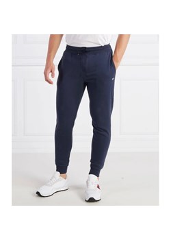 Tommy Jeans Spodnie dresowe TJM SLIM FLEECE SWEA | Slim Fit ze sklepu Gomez Fashion Store w kategorii Spodnie męskie - zdjęcie 164331899