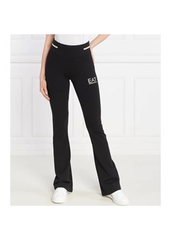 EA7 Spodnie dresowe | flare fit ze sklepu Gomez Fashion Store w kategorii Spodnie damskie - zdjęcie 164333677