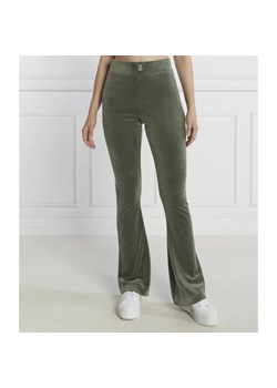Juicy Couture Spodnie dresowe FREYA | flare fit ze sklepu Gomez Fashion Store w kategorii Spodnie damskie - zdjęcie 164336787