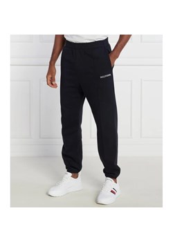 Tommy Hilfiger Spodnie dresowe MONOTYPE EMBRO SWEATPANT | Regular Fit ze sklepu Gomez Fashion Store w kategorii Spodnie męskie - zdjęcie 164338245