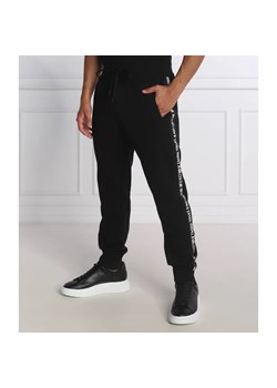 Versace Jeans Couture Spodnie dresowe | Regular Fit ze sklepu Gomez Fashion Store w kategorii Spodnie męskie - zdjęcie 164338959