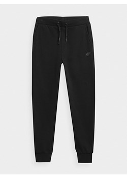 4F Spodnie dresowe w kolorze czarnym ze sklepu Limango Polska w kategorii Spodnie chłopięce - zdjęcie 164354397