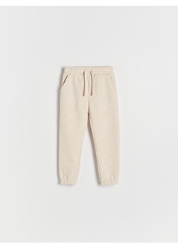 Reserved - Dresowe spodnie jogger - beżowy ze sklepu Reserved w kategorii Spodnie dziewczęce - zdjęcie 164496797