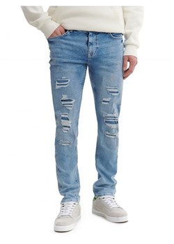 Cropp - Jasnoniebieskie jeansy skinny z dziurami - niebieski ze sklepu Cropp w kategorii Jeansy męskie - zdjęcie 165743256