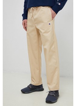 Champion spodnie męskie kolor beżowy proste 216544-TTP ze sklepu PRM w kategorii Spodnie męskie - zdjęcie 166194529