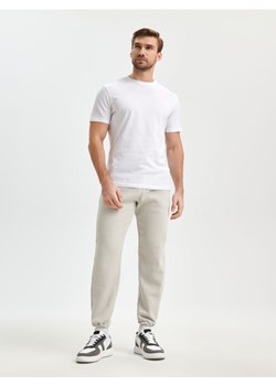 Sinsay - Spodnie regular jogger - kremowy ze sklepu Sinsay w kategorii Spodnie męskie - zdjęcie 166247189