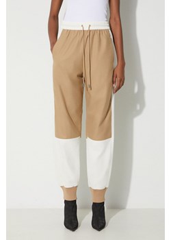 JW Anderson spodnie dresowe z domieszką wełny kolor beżowy wzorzyste TR0294.PG1364 ze sklepu PRM w kategorii Spodnie damskie - zdjęcie 166297248
