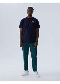 Spodnie Dresowe VOLLEY Zielony S ze sklepu Diverse w kategorii Spodnie męskie - zdjęcie 166698436