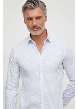 Calvin Klein koszula męska kolor biały slim z kołnierzykiem klasycznym ze sklepu ANSWEAR.com w kategorii Koszule męskie - zdjęcie 166929055