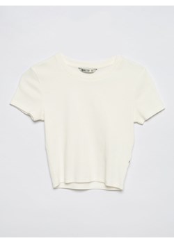 Koszulka damska z krótkim rękawem z prążkowanej dzianiny o kroju slim biała Riatta 100 ze sklepu Big Star w kategorii Bluzki damskie - zdjęcie 167423448