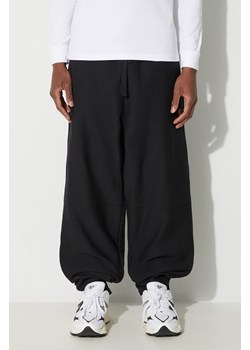 Carhartt WIP spodnie dresowe American Script Jogging Pant kolor czarny gładkie I027042.89XX ze sklepu PRM w kategorii Spodnie męskie - zdjęcie 167545909
