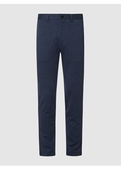 Spodnie o kroju tapered fit z dodatkiem streczu model ‘Liam’ ze sklepu Peek&Cloppenburg  w kategorii Spodnie męskie - zdjęcie 167652768