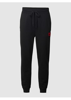 Spodnie dresowe z bawełny model ‘Doak212’ ze sklepu Peek&Cloppenburg  w kategorii Spodnie męskie - zdjęcie 167669705